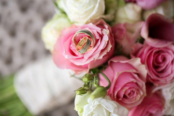 Close up with beautiful flowers and rings