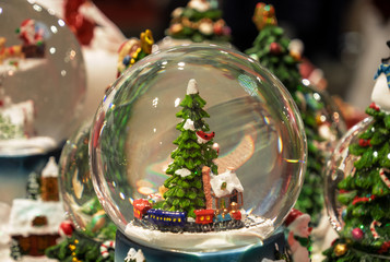 crystal ball with a snowy Christmas landscape