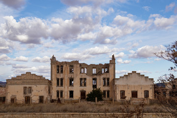 Fototapeta premium Old mansion house falling into ruins in rural spain