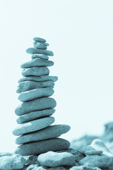 inspirational pile of stones, man made, well balanced and stacked seaside