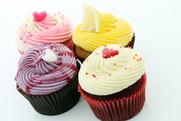 Colorful Cupcakes on a white background