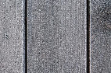 surface of wooden planks with hoarfrost in winter for background