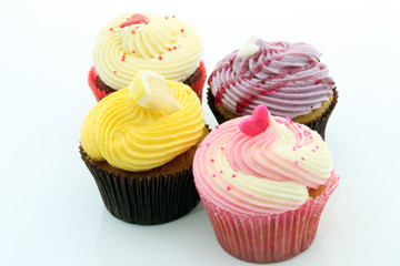 Colorful Cupcakes on a white background