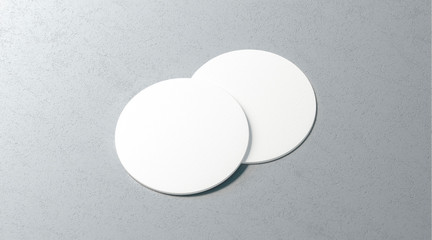 Blank white two beer coasters mockup set on surface