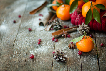 tangerines, scarf and cones