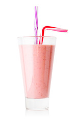 Berry smoothie or yogurt in tall glass with two striped straw