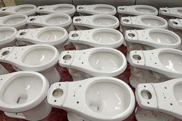 Ceramic toilet parts in a factory