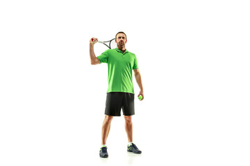 The one caucasian man playing tennis isolated on white background. Studio shot of fit young player at studio in motion or movement during sport game..