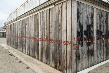 Facades covered with wooden planks to protect against winter weather and storms of the sea, and by possible malicious thieves