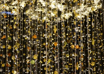 abstract image of the lines of crystal chandelier on black background