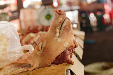 Pig head for sale in a market in Cambodia