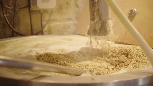 Artisanal Brewing in Montpellier France. Cereal grains and water fermenting. Beer production process