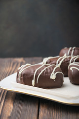 tasty chocolate cake on a white tray