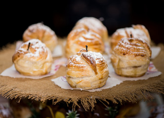 Baked apples in the dough coat.