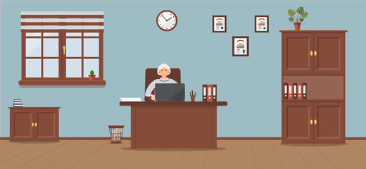 An elderly woman sitting in the workplace in a spacious office on a light blue background. Vector illustration.Table, wardrobe, monstera, diplomas. Wooden floor. Perfect for advertising