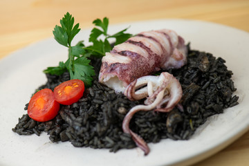 Black risotto with squids