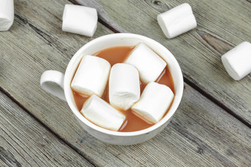 Hot chocolate with marshmallows on the table