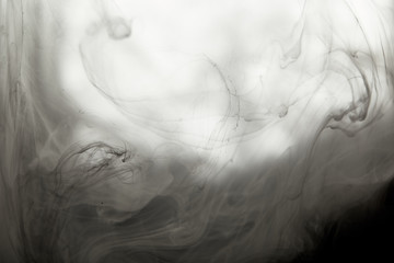 abstract smoky texture with black paint swirls