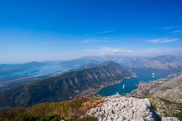 Beautiful landscape view of Bay of Kotor in Montenegro with blue cloudy sky