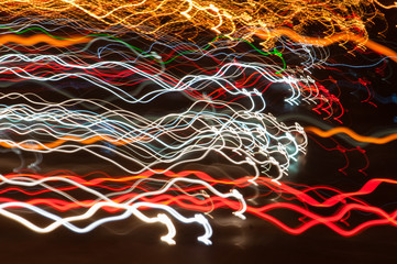 Abstract background, lights blurred in motion. Celebration concept