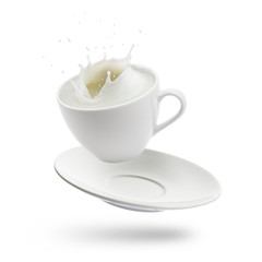 Cup full of milk jumps and splash on white background