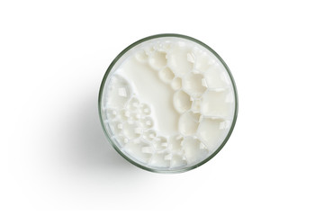 top view glass full of milk on white background