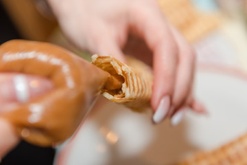 Fill waffles with glaze. Pour glaze in waffles. Sweet waffles. Home cooking. Natural food.