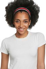 Three quarter portrait of smiling African girl with short curly hair. The woman is wearing a bright training headband and white T-shirt. The lady is posing and looking at camera on white background.