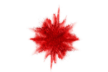 Freeze motion of red powder exploding, isolated on white background. Abstract design of red dust...