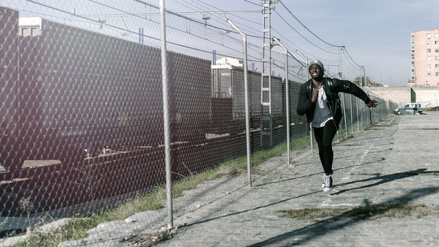 Young man running and missing the train