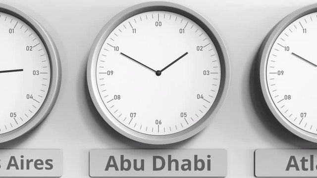 Focus on the clock showing Abu Dhabi, United Arab Emirates time. 3D animation