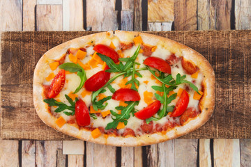 pizza with mozzarella, emmental and cheddar cheese