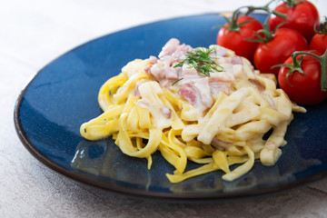 tasty Carbonara pasta on the table