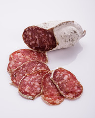 Saucisson sec delicious french salami on a white background