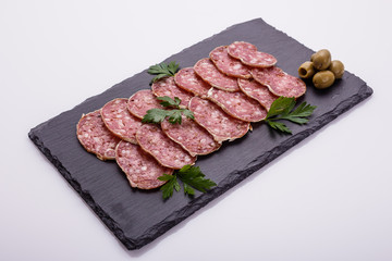 Saucisson sec delicious french salami on a white background