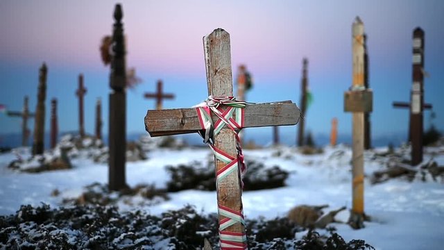 Wooden crosses on the top of a mountain in winter season