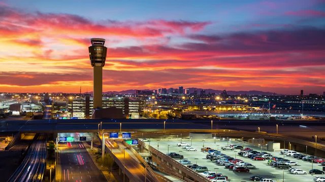 Phoenix AZ Vibrant City Skyline Sunset Timelapse with Downtown Buildings and Streaking Lights from Driving Traffic in a Colorful Sky during Arizona Dusk