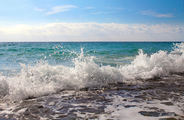 Surge of sea waves near the shore.