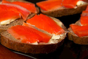 Fresh salmon sandwich with salted salmon and butter and dark bread