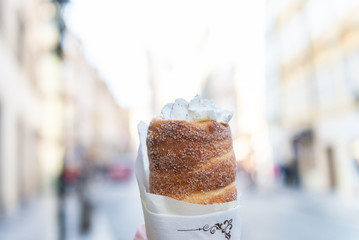 Popular street food in Prague - traditional Czech sweet treat Trdelnik, Czech Republic