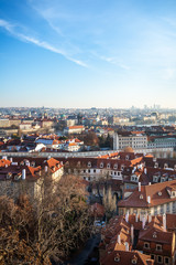 Fototapeta na wymiar View on Prague panorama with red roofs and historic architecture from staromestska radnice, Old Town Hall, Czech Republic
