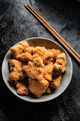 Delicious crispy fried chicken breast strips.