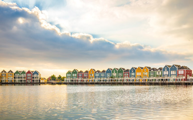 Naklejka premium Dutch, modern, colorful vinex architecture style houses at waterside HDR