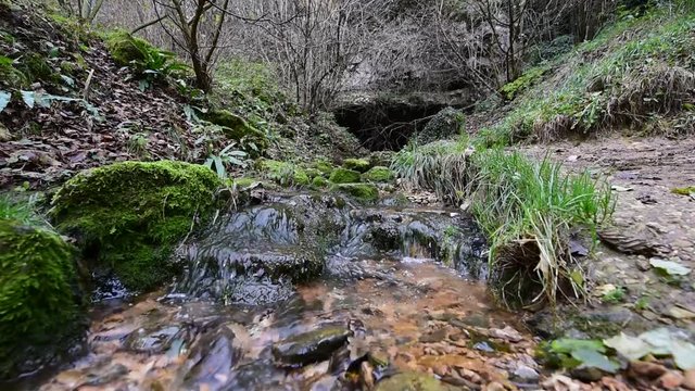 Small river at Ponte di Veja, Lessinia, Verona surrounded by stones and moss