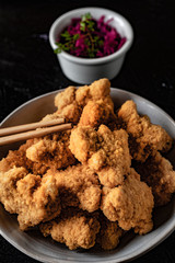 Delicious crispy fried chicken breast strips.