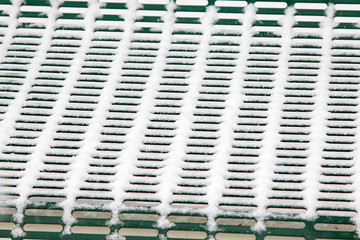 Metal net cover in snow