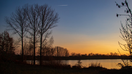 Fototapeta na wymiar Beautiful sunset with reflections at Steinkirchen-Danube-Bavaria-Germany