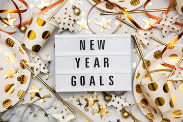 New year goals lightbox celebration message with luxury gold party decorations