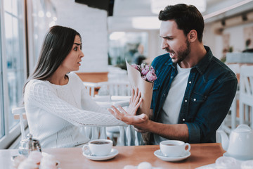 Couple is Have a Conflict in Cafe