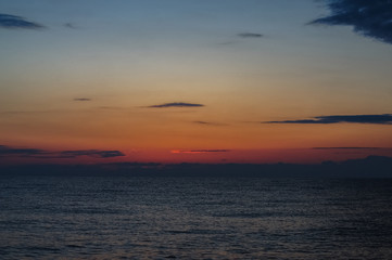 Morning sunrise on the horizon of Aegean sea.
